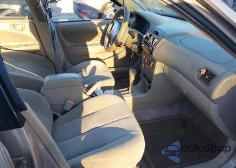 2002 Toyota Corolla Le from USA, damaged, VIN 2T1BR12E62C529586